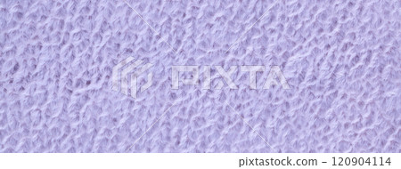 Texture fluffy light violet woolen textile background from soft fleecy material, macro. Structure pastel purple fabric 120904114