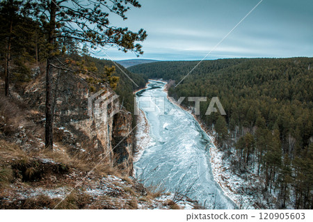River and rocky coast in the taiga in winter River and rocky coast in the taiga in winter 120905603