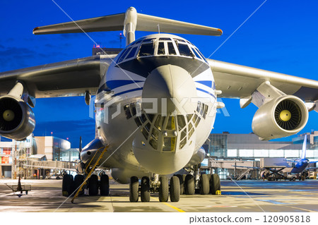 Cargo airplane at the airport apron in the night 120905818