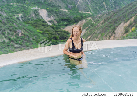 Female tourist at the hot springs of Grutas Tolantongo, Mexico. Adventure, relaxation, and natural wellness concept 120908185