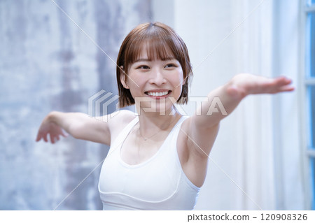 Young woman doing yoga in the morning Young woman doing yoga in the morning 120908326