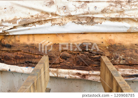 Removed Deck Ledger Board Reveals Dry Rotten Rim Joist Board with Extensive Damage on House Removed Deck Ledger Board Reveals Dry Rotten Rim Joist Board with Extensive Damage on House 120908785