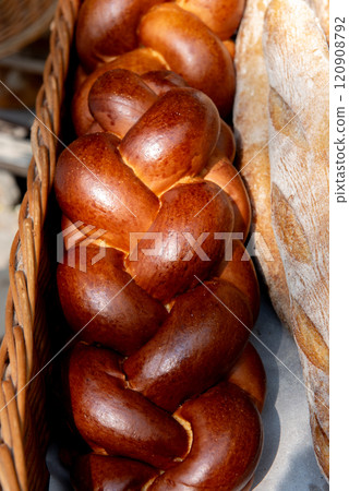 Homemade traditional greek braided brioche.Braided brioche, festive traditional challah, Sweetbreads Homemade traditional greek braided brioche.Braided brioche, festive traditional challah, Sweetbreads 120908792