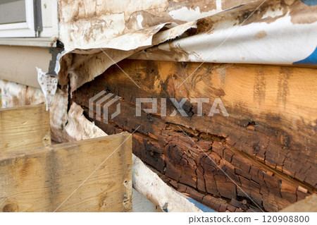 Removed Deck Ledger Board Reveals Dry Rotten Rim Joist Board with Extensive Damage on House Removed Deck Ledger Board Reveals Dry Rotten Rim Joist Board with Extensive Damage on House 120908800