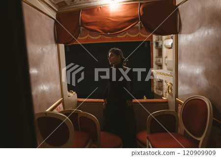 An Elegant Woman is Captured in a Stunning Theatrical Setting, Bringing to Life Artistry and Style 120909909
