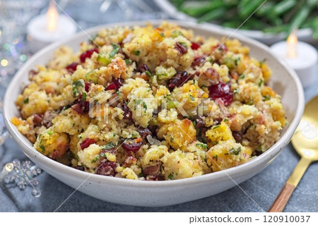 Cranberry pecan cornbread dressing for poultry or meat stuffing, in bowl, horizontal closeup Cranberry pecan cornbread dressing for poultry or meat stuffing, in bowl, horizontal closeup 120910037