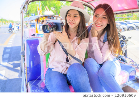 Traveling in Bangkok with traditional tuk tuk taxi 120910609