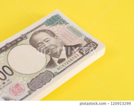 A stack of new 10,000 yen bills of Eiichi Shibusawa, 1 million yen, yellow background 120913299
