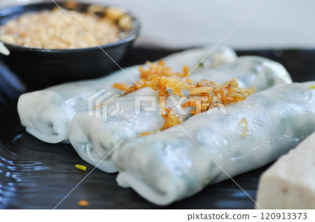vegetable rolls or rice rolls , fresh rolls or fresh spring rolls vegetable rolls or rice rolls , fresh rolls or fresh spring rolls 120913373