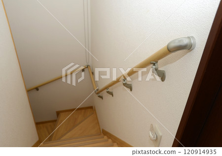 Handrails on narrow and dangerous indoor stairs in senior housing 120914935