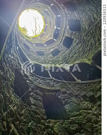 Initiation Well (Inverted tower) at park of Quinta da Regaleira palace in Sintra, Portugal Initiation Well (Inverted tower) at park of Quinta da Regaleira palace in Sintra, Portugal 120916313