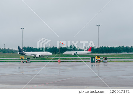 Airport and runway scenery on a rainy day Airport and runway scenery on a rainy day 120917371