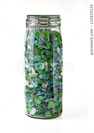 glass jar with blue and green shards of sea glass isolated on white background glass jar with blue and green shards of sea glass isolated on white background 120919126