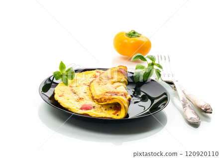 fried omelette with sweet pepper and vegetables in a plate, isolated on white background fried omelette with sweet pepper and vegetables in a plate, isolated on white background 120920110