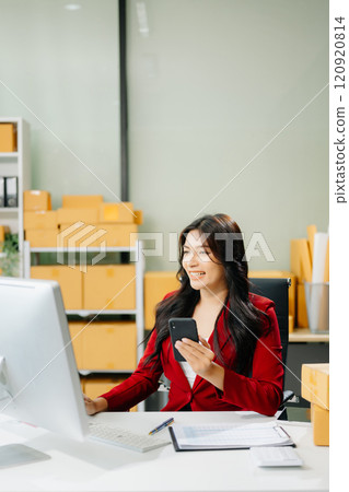 Startup small business SME, Entrepreneur owner woman using smartphone or tablet taking receive and checking 120920814