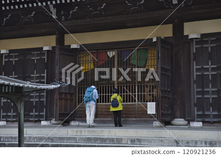 Nanzenji Temple: People praying at the lecture hall 2 Nanzenji Temple: People praying at the lecture hall 2 120921236