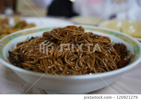 The delicious black noodles of Jjajangmyeon, a representative Korean-style Chinese dish The delicious black noodles of Jjajangmyeon, a representative Korean-style Chinese dish 120921279