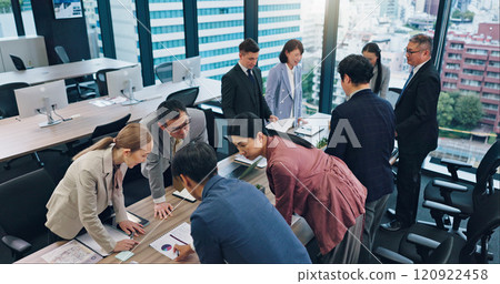 Employees, accounting paperwork and office meeting for review, communication and teamwork in Japan. Business people, investment report and workplace for briefing, revenue project and brainstorming Employees, accounting paperwork and office meeting for review, communication and teamwork in Japan. Business people, investment report and workplace for briefing, revenue project and brainstorming 120922458