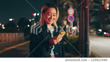 Night, waiting and woman at in city with phone, happy travel and checking online public transport schedule. Smartphone, search and Japanese girl in street with smile, mobile app and urban commute Night, waiting and woman at in city with phone, happy travel and checking online public transport schedule. Smartphone, search and Japanese girl in street with smile, mobile app and urban commute 120922480
