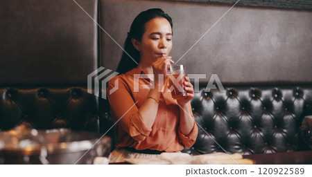 Woman, restaurant and drinking beverage in Japan, relax and customer in bistro for ice tea. Female person, coffee shop and weekend trip to cafe for lunch, peace and fresh cold caffeine on holiday 120922589