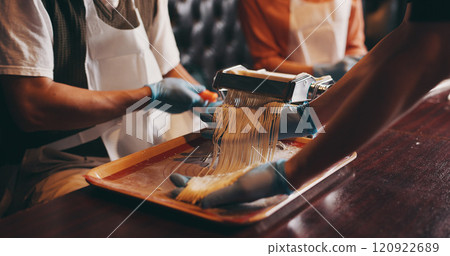 Hands, ramen and meal prep with noodle cutter, cooking class and chef in Japanese restaurant for lunch. People, process and culinary skills as customer in hospitality, diet and healthy food for dish 120922689