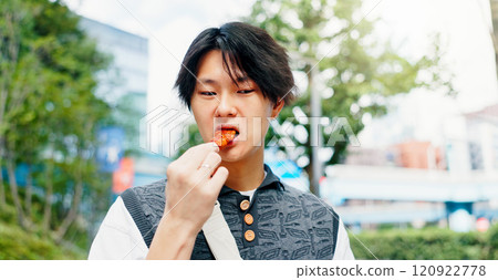Street food, eating and travel with Japanese man in city for chicken teriyaki, hunger and nutrition. Health, traditional cuisine with culture with person and skewer snack in Japan for lunch and trip Street food, eating and travel with Japanese man in city for chicken teriyaki, hunger and nutrition. Health, traditional cuisine with culture with person and skewer snack in Japan for lunch and trip 120922778