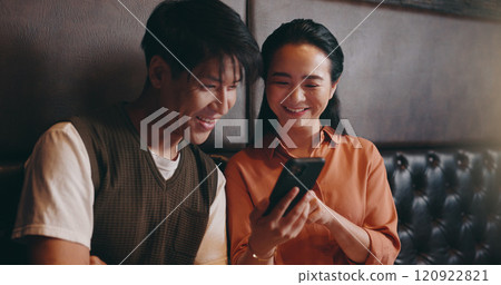 Japanese, couple and happy with mobile for restaurant, online menu and website with conversation. Valentines day, man and woman with phone application for digital order, options and bonding on date Japanese, couple and happy with mobile for restaurant, online menu and website with conversation. Valentines day, man and woman with phone application for digital order, options and bonding on date 120922821