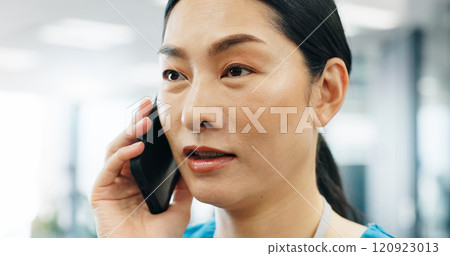 Asian woman, surgeon or phone call at hospital for healthcare service support or medical results in office. Mobile, nurse or talking to patient for consultation advice or appointment booking in Japan Asian woman, surgeon or phone call at hospital for healthcare service support or medical results in office. Mobile, nurse or talking to patient for consultation advice or appointment booking in Japan 120923013