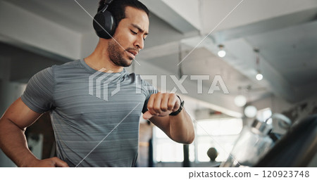 Fitness, gym and man with time, music and heart rate check with treadmill and runner stats. Stopwatch, run and wellness app with exercise, training and pulse tracking for workout with monitor tech Fitness, gym and man with time, music and heart rate check with treadmill and runner stats. Stopwatch, run and wellness app with exercise, training and pulse tracking for workout with monitor tech 120923748
