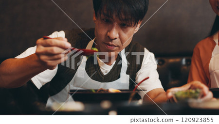 Cooking, ramen and bowl with Japanese man in restaurant for fine dining course, dinner and learning recipe. Ingredients, culture and food with asian people in class for diet, menu and meal prep 120923855