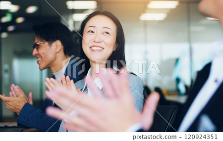 Japan, applause and business people in meeting, woman and achievement with success. Group, employees and coworkers in modern office, congratulations and clapping with smile, celebration and happiness 120924351