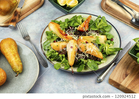 Salad with liver, caramelized pear in a plate. Salad with liver, caramelized pear in a plate. 120924512