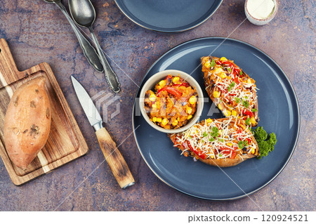Plate with stuffed sweet potatoes. 120924521