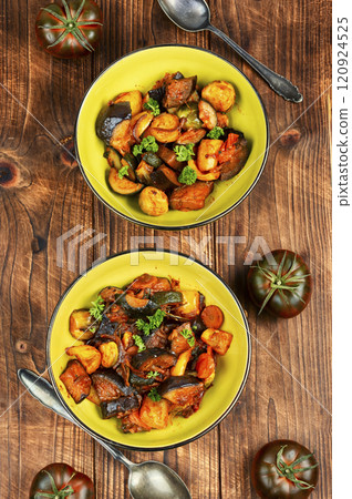 Vegetable stew with sauce. 120924525