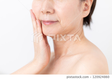 Middle-aged to senior women's skin care image 120924860