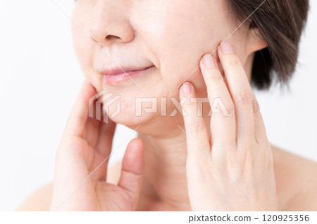 Middle-aged to senior women's skin care image 120925356
