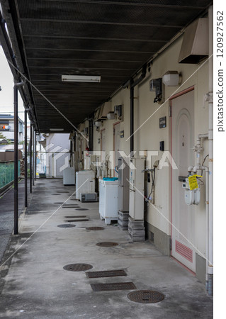 Entrance hall to an old apartment building 120927562