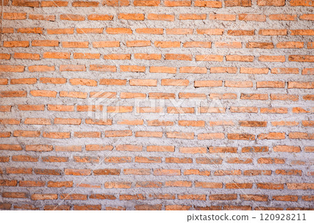 Photograph of high detail red brick wall and concrete close up. Photograph of high detail red brick wall and concrete close up. 120928211