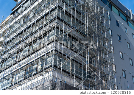 After assembling temporary scaffolding for large-scale repair work 120928516