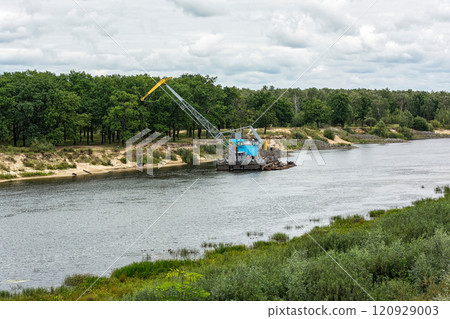Belarus, Gomel - August 30, 2017: Cleaning of the river bed of the coolant by the ship of the technical fleet Belarus, Gomel - August 30, 2017: Cleaning of the river bed of the coolant by the ship of the technical fleet 120929003