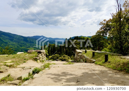 View of the ruins of Tsuwano Castle and Demaru on the top of a mountain overlooking the city of Tsuwano. Tsuwano Town, Kashima Prefecture View of the ruins of Tsuwano Castle and Demaru on the top of a mountain overlooking the city of Tsuwano. Tsuwano Town, Kashima Prefecture 120930700