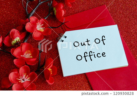Top view of Out Of Office text with Chinese New Year decoration. Copy space and Chinese New Year celebration. Top view of Out Of Office text with Chinese New Year decoration. Copy space and Chinese New Year celebration. 120930828