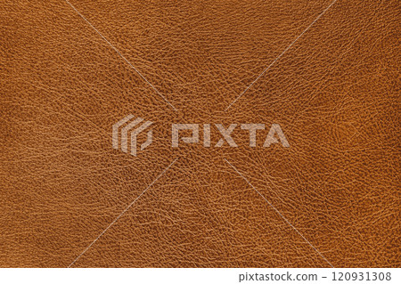 Structure of genuine leather, shiny orange leatherette surface with slightly grainy texture 120931308