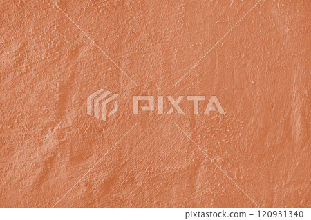 Textured orange plaster wall surface with brushstroke, painted, aged concrete background 120931340