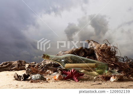 Message in a vintage bottle on a sea shore. 120932139