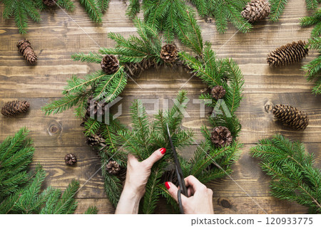 Making Christmas wreath using fresh and all natural materials. Flat lay. Top view. 120933775