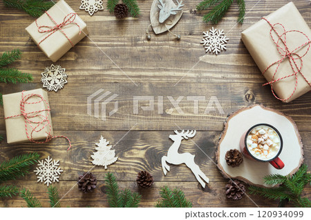 Christmas composition with giftbox, deer, red balls, cones. Xmas Holiday card. Christmas composition with giftbox, deer, red balls, cones. Xmas Holiday card. 120934099