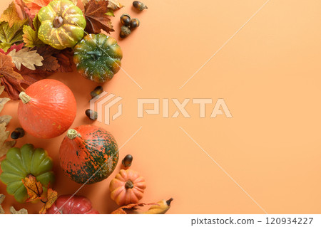 Autumn frame with pumpkins, colorful leaves on orange. Thanksgiving Day. Autumn frame with pumpkins, colorful leaves on orange. Thanksgiving Day. 120934227