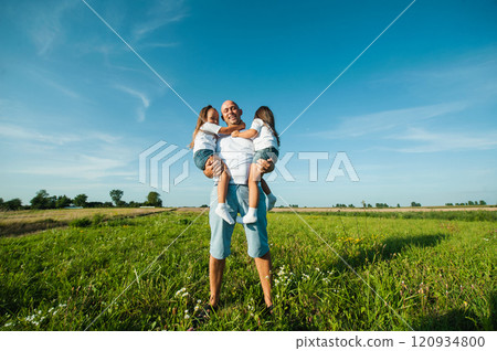 Happy kids dad and mom are kissing and hugging. Happy kids dad and mom are kissing and hugging. 120934800
