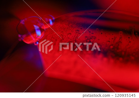 Red and blue fluid reflections on black background, liquid abstraction, colour waves, deep dark backgrounds, geometric water shapes Red and blue fluid reflections on black background, liquid abstraction, colour waves, deep dark backgrounds, geometric water shapes 120935145